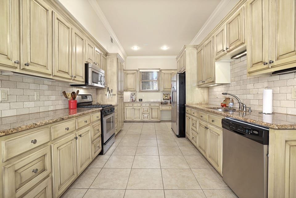 Kitchen area, stove and micro on the left, fridge and dishwasher on the right.