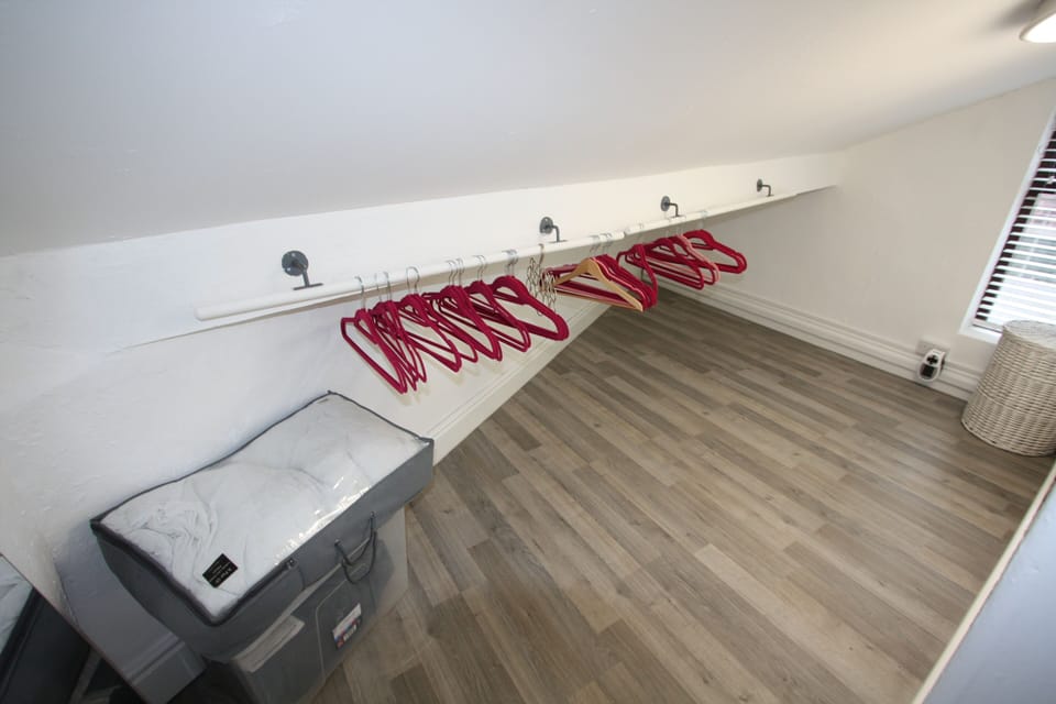 Walk in wardrobe from bedroom number 2