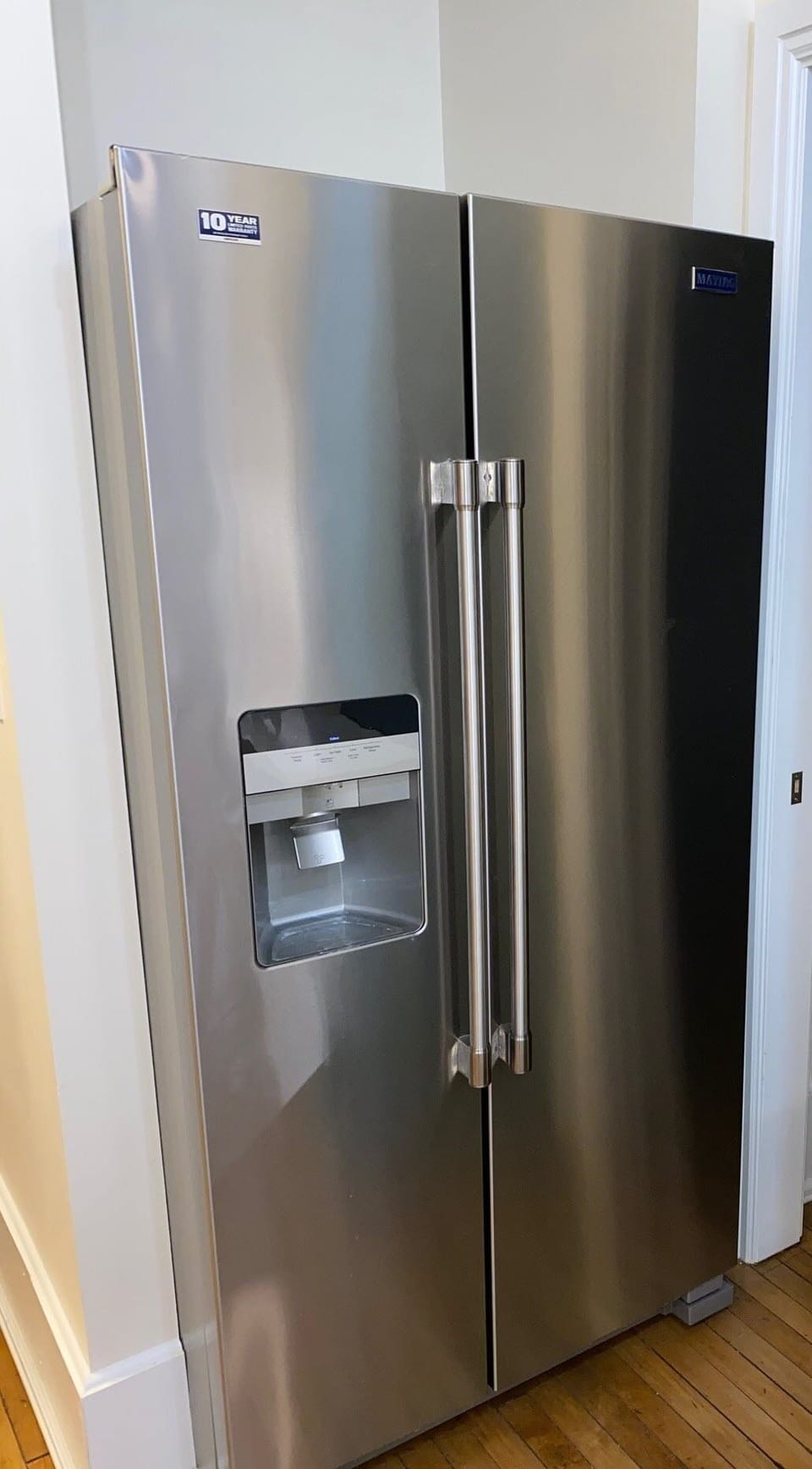 Refridgerator with water and ice dispenser.