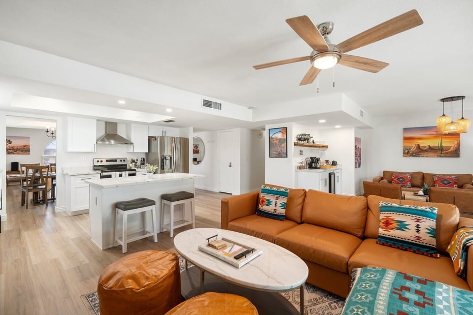 Gather family friendly open concept kitchen and living space. 