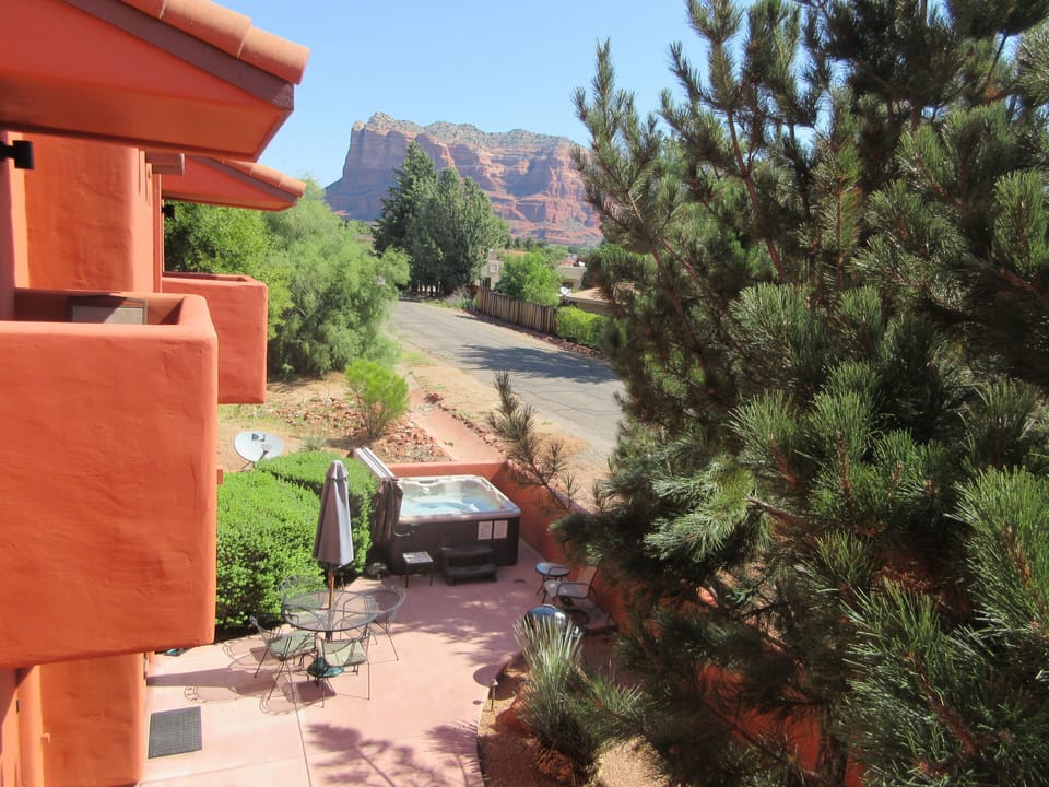 Balcony that shows the views and your large patio space with 2 hot tubs.