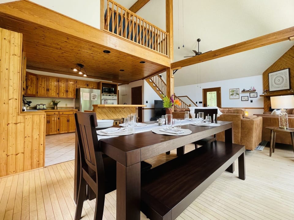 Dining table seats 9. There are two stools for additional seating 