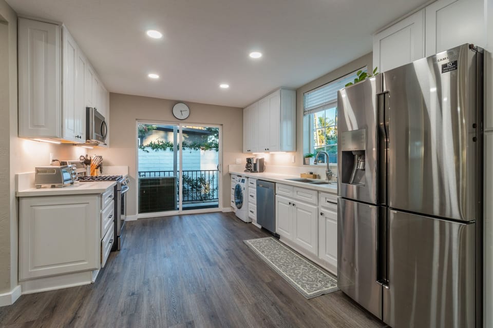 Spacious kitchen stocked with seasonings and olive oil to host family dinners!
