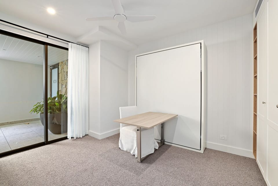 3rd bedroom with Italian queen wall bed and/or desk