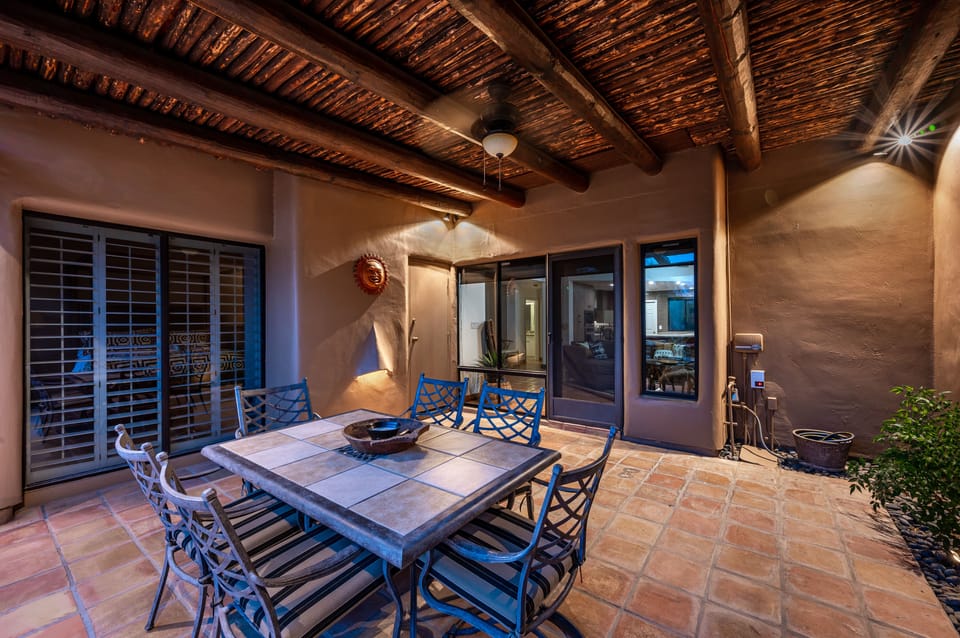 Gather around the 6 person outdoor dining table.