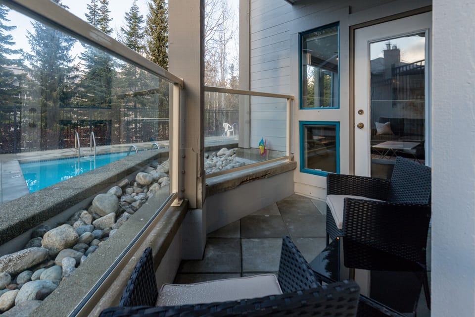 Patio - Outdoor seating overlooking the communal pool.