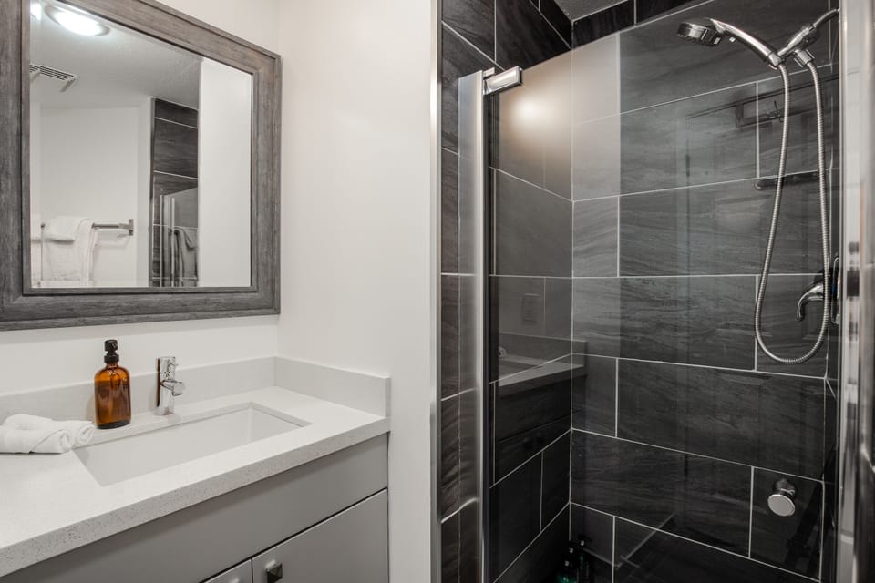 Second Bathroom - The shared second bathroom offers a single stand-up shower.