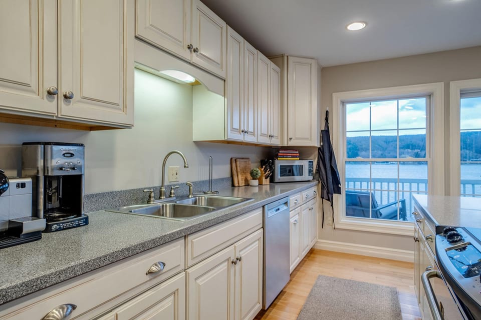 Kitchen is fully stocked with cookware/dinnerware