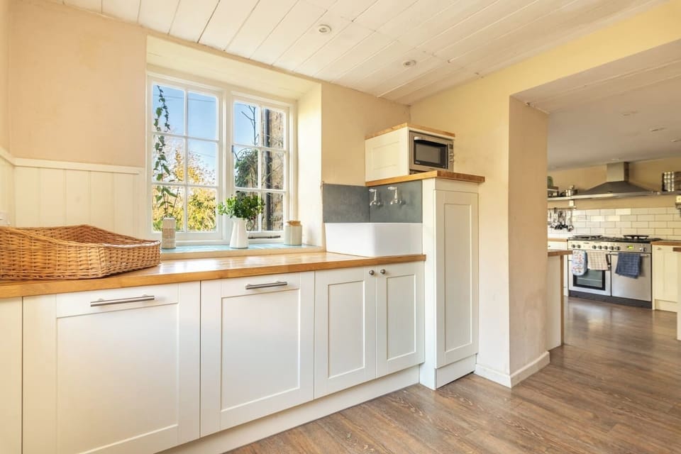 Back Kitchen has 2 large upright fridges