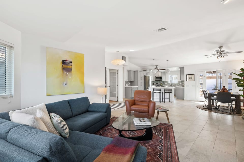 Open floor plan for living, cooking and dining.