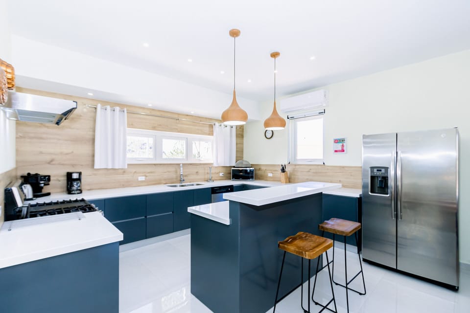 Well-Designed Kitchen of the 4BR Home in Noord Aruba - Ample storage space for organized and clutter-free counters - Open concept connecting the kitchen to the dining or living area - Thoughtful placement of kitchen essentials for easy access