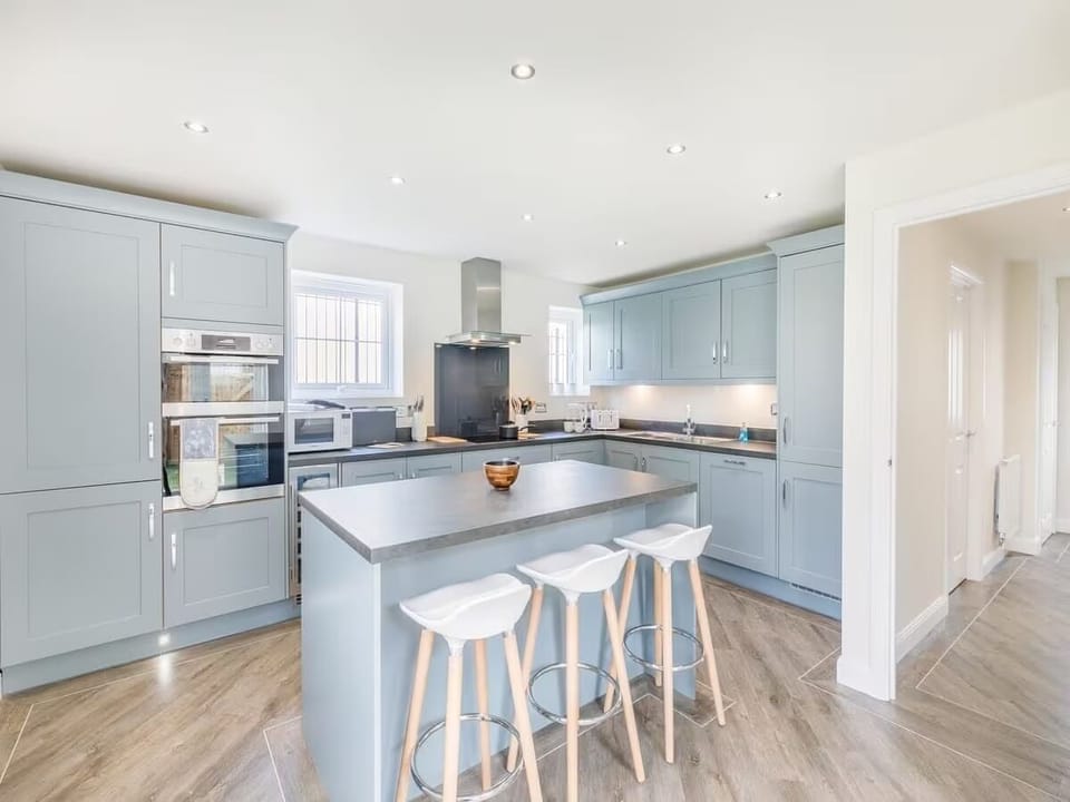 Kitchen with Island and Chairs