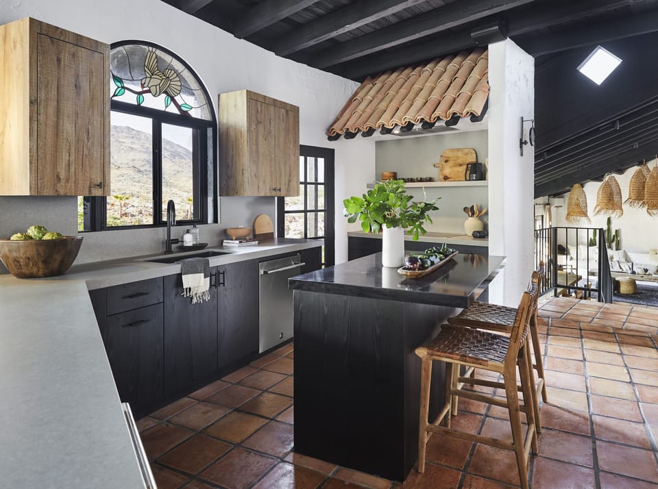Kitchens always get a lot of love (and a lot of spills!), so we used quartzite, which is really durable.