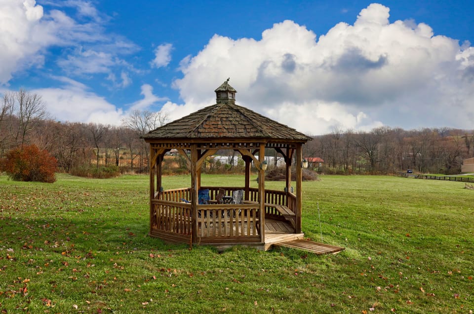 Enjoy this beautiful gazebo with pond view