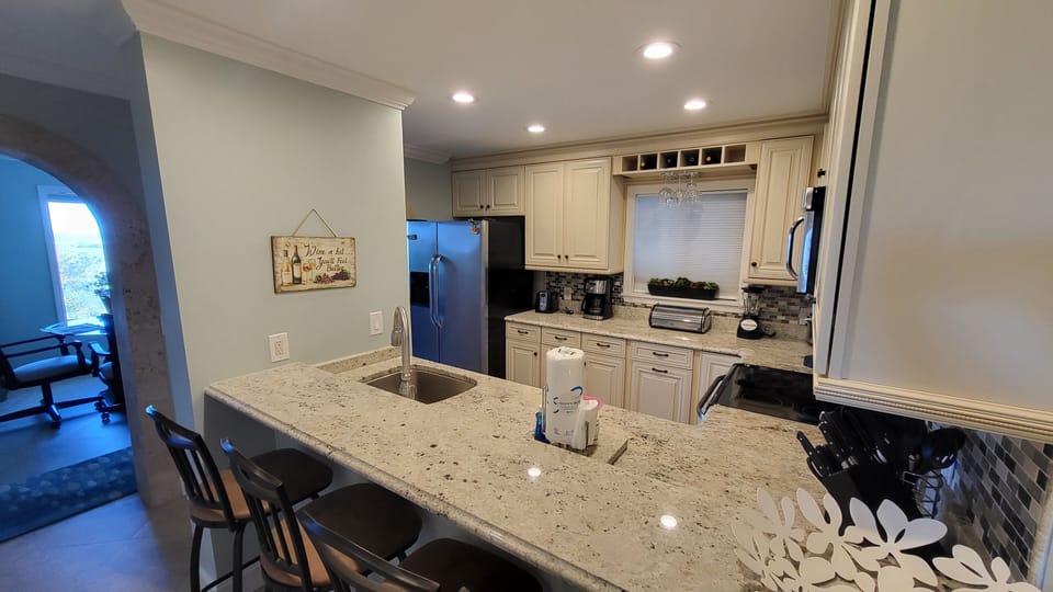 Seating for four at the bar while you prep and cook