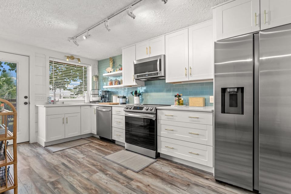 Kitchen has all new appliances and fully stocked with amenities