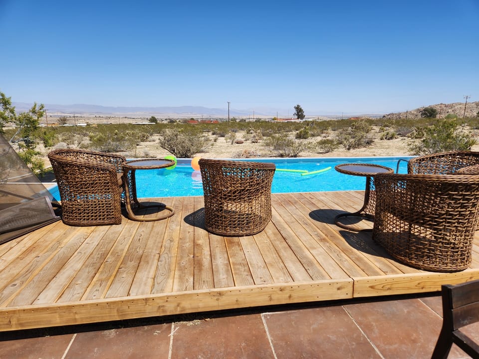 16 x32 foot pool is open year-round,  the hot tub is more suitable for winter