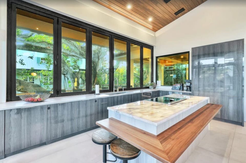 Large kitchen with sliding windows