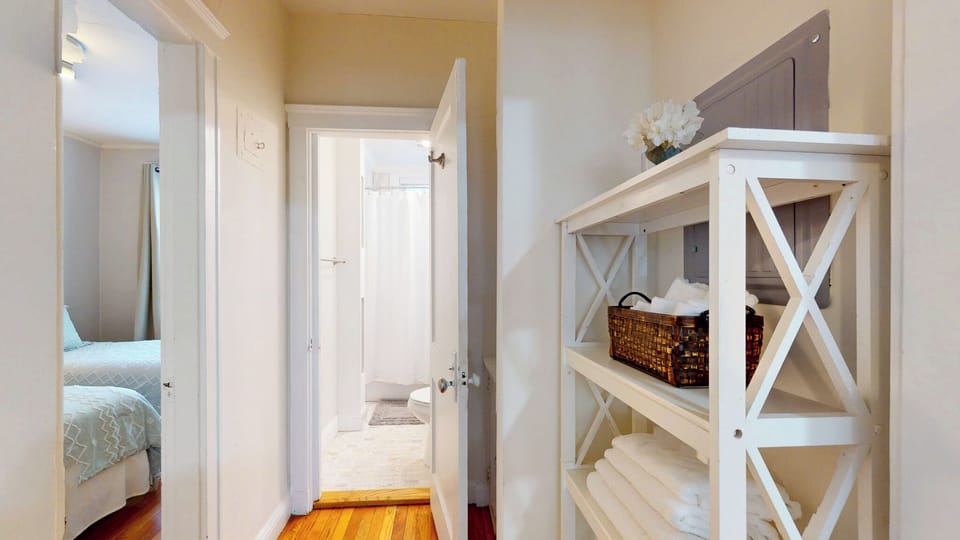 Linen storage just outside the bathroom and living room.
