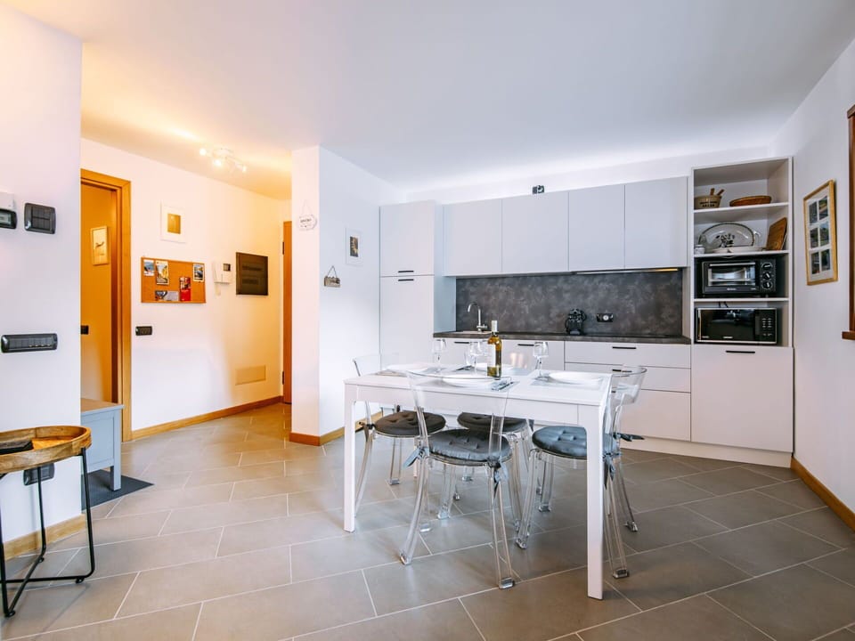 Furniture, Table, Wood, Lighting, Cabinetry, Countertop, House, Flooring, Building, Interior Design