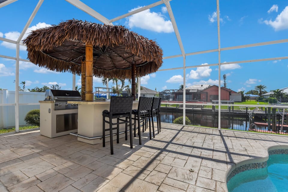 Poolside Tiki Hut with BBQ grill