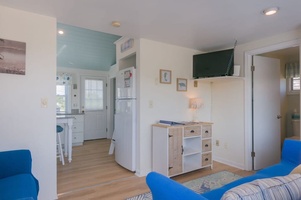 Living/kitchen area with TV.