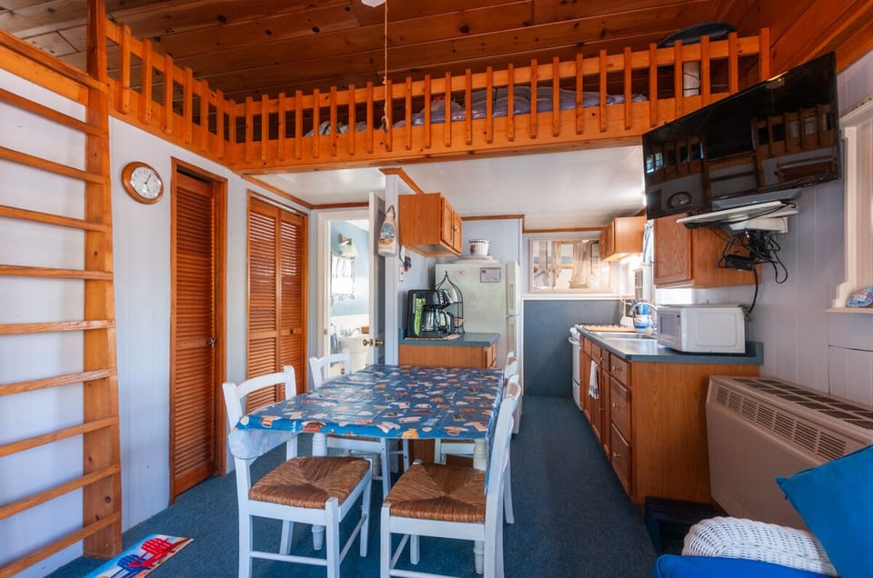 Open concept kitchen, dining and loft.
