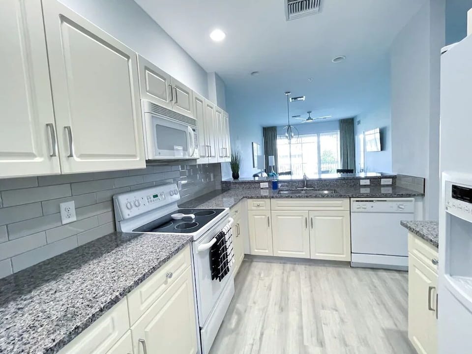 Full Kitchen w/ all of the essentials included. (soap, coffee, detergent, etc.)