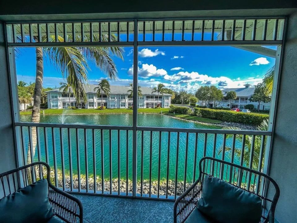 Balcony with 2 Chairs and a Table
