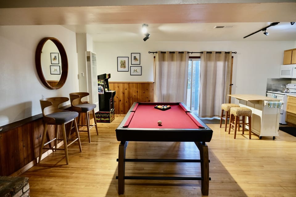 Downstairs pool table and arcade game