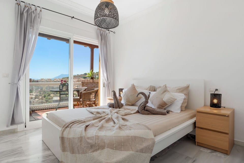 Bright bedroom with private terrace.