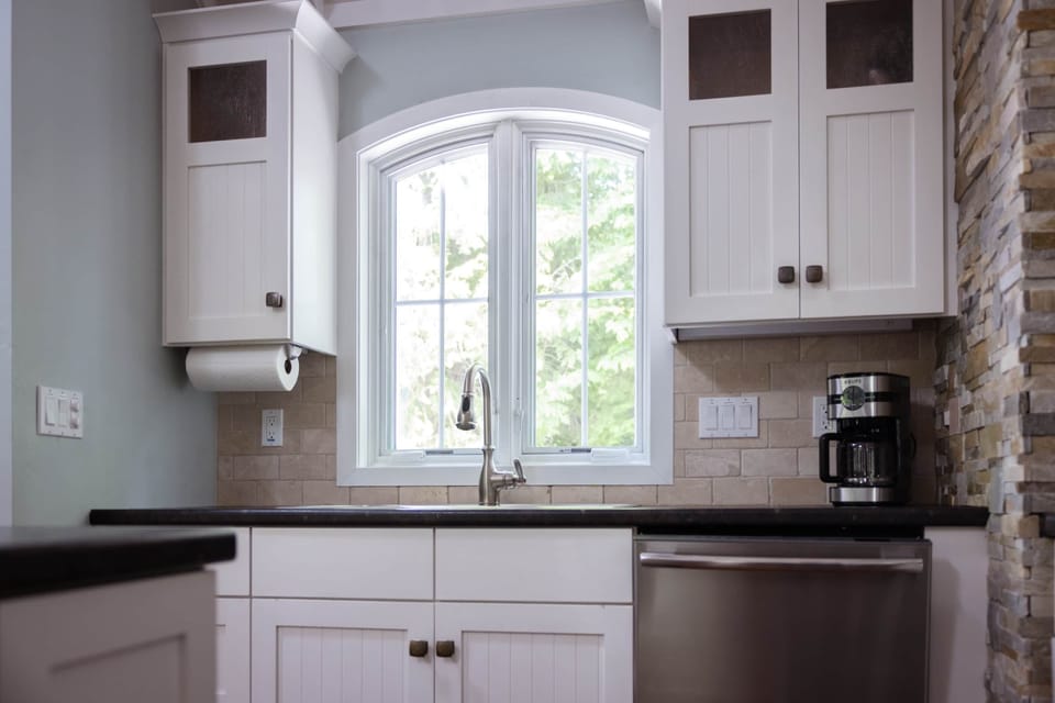 Large sink area with a dishwasher for convenience.