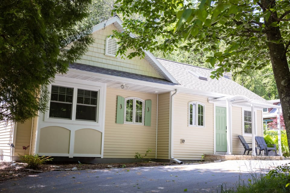 Arbor Cottage burnt down in 2011 and was rebuilt in 2012 with an open concept and vaulted ceilings.