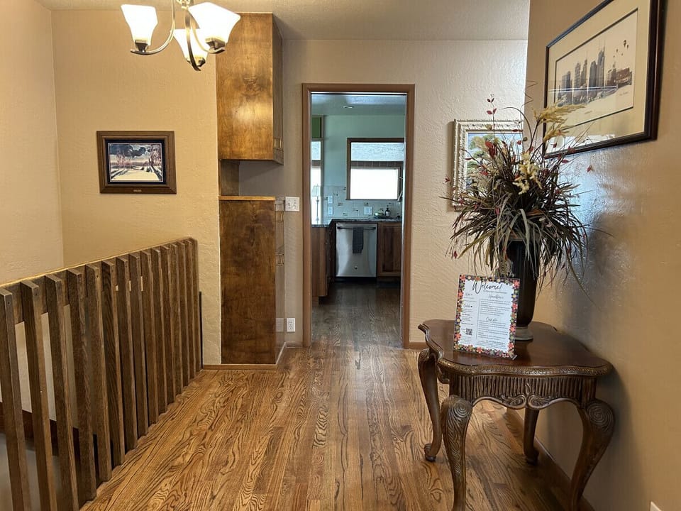 Kitchen and staircase from entrance