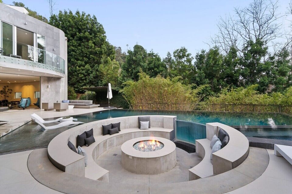 Fire place flush with pool
