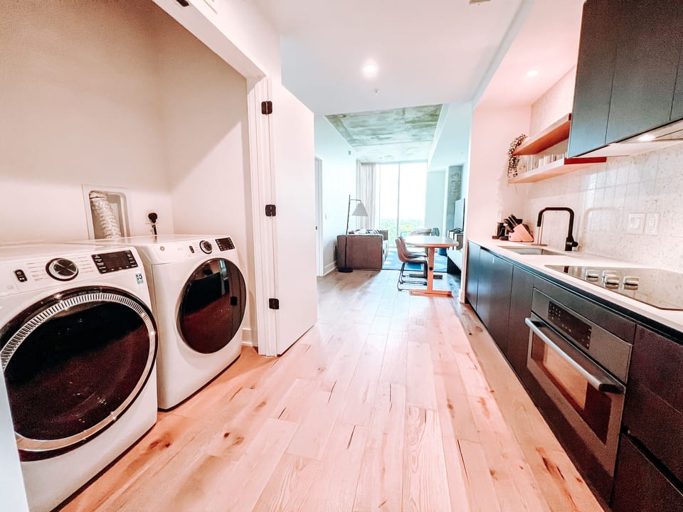 Washer and dryer are in unit with detergent provided