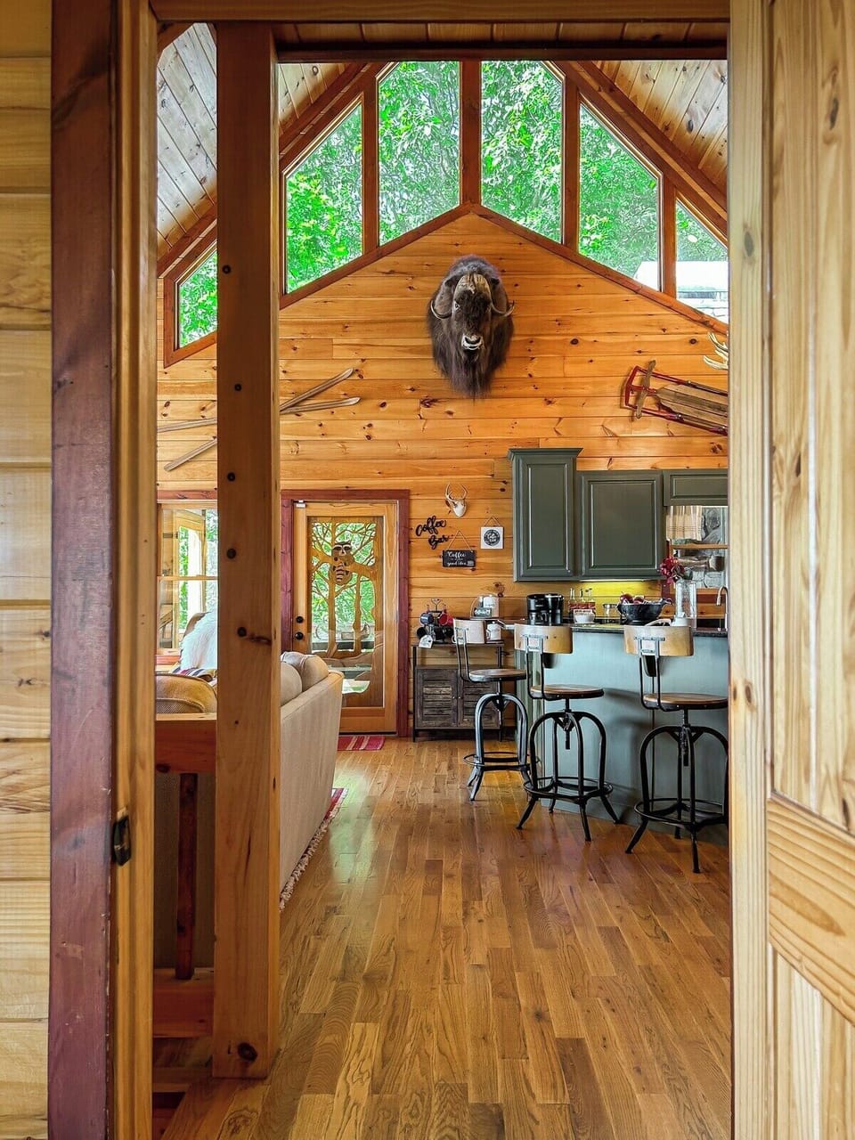 Just off the great room is the main floor King suite…