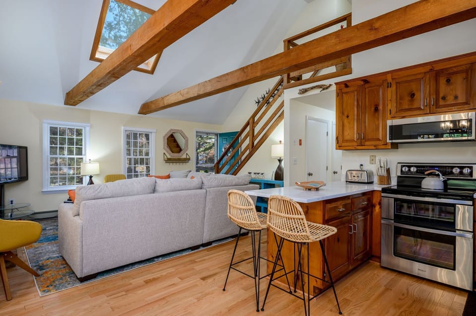 View of the kitchen and living spaces from the dining area