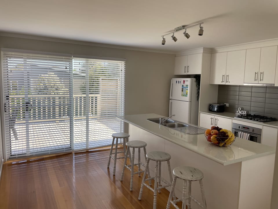 Kitchen and door to outside deck