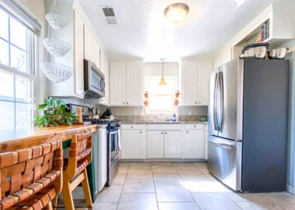 Enjoy your breakfast overlooking the backyard in this adorable sitting area. 