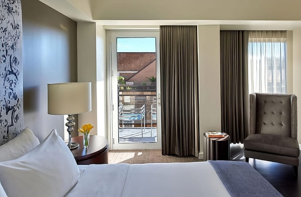 Step out to fresh air and relax beside tall windows.