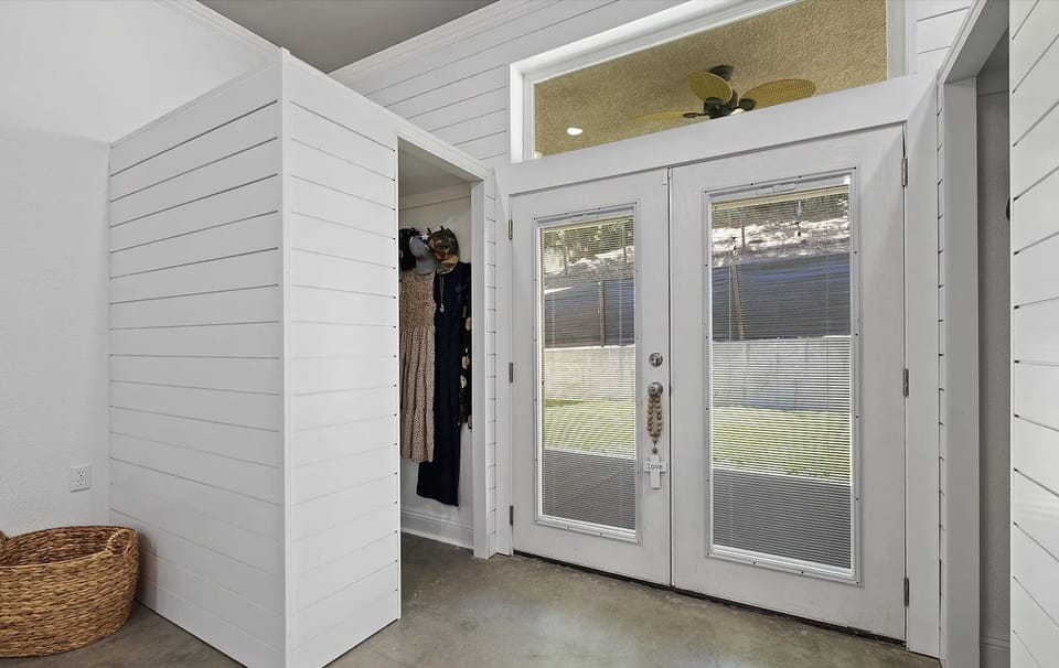 French door in the bedroom downstairs leads to the backyard.