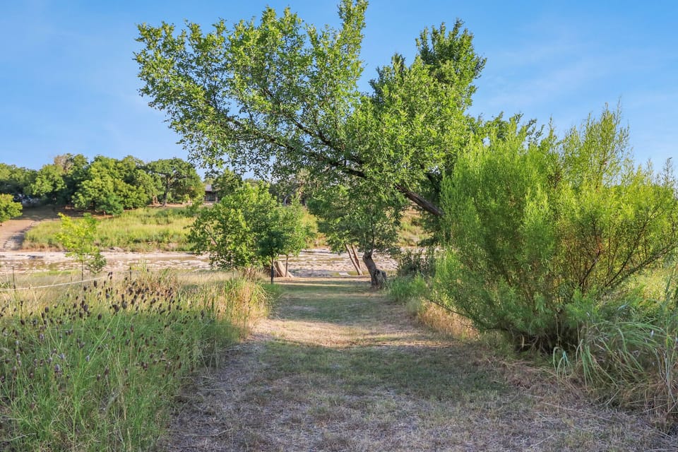 Follow the path down to the Blanco River
