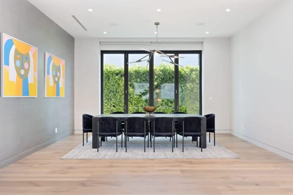 Open and elegant dining room with modern art