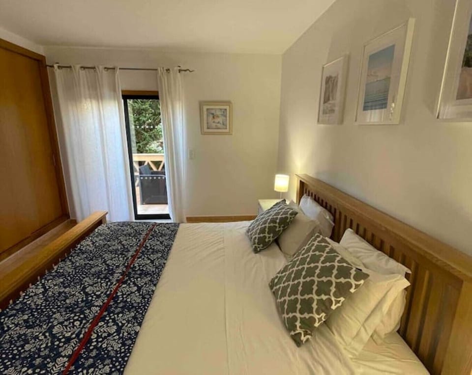 The master bedroom has direct access to the secluded rear garden terrace