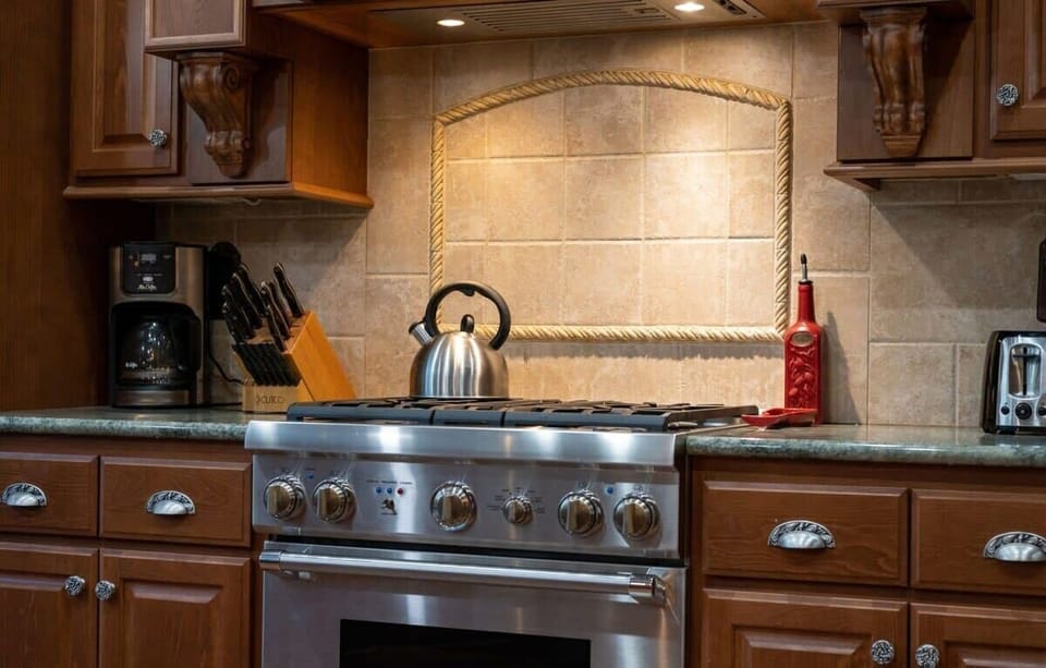 Cook memorable meals in your fully-equipped gourmet kitchen, complete with professional-grade stove and beautiful granite countertops.