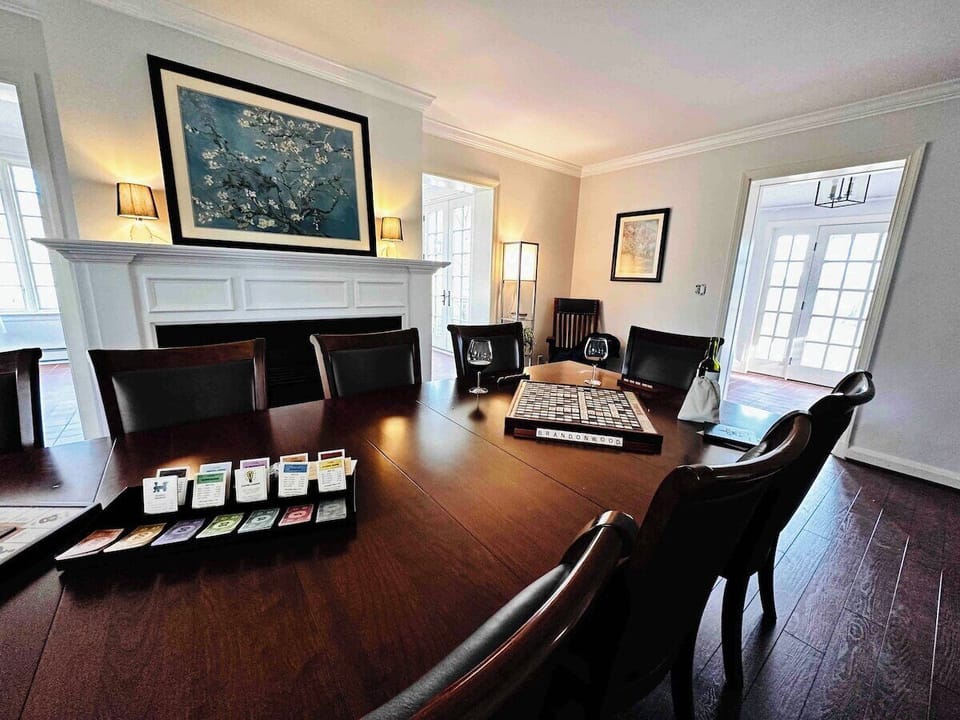 Enjoy dinner or a board game in the dining room with beautiful views, a fireplace, and seating for 10. Highchair and child-safe dishware are available.