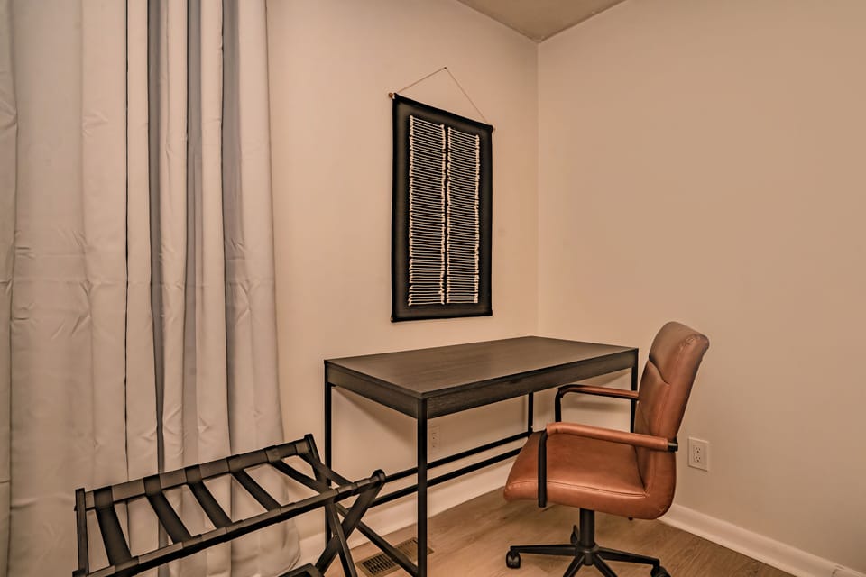 Dedicated workspace with sofa bed.