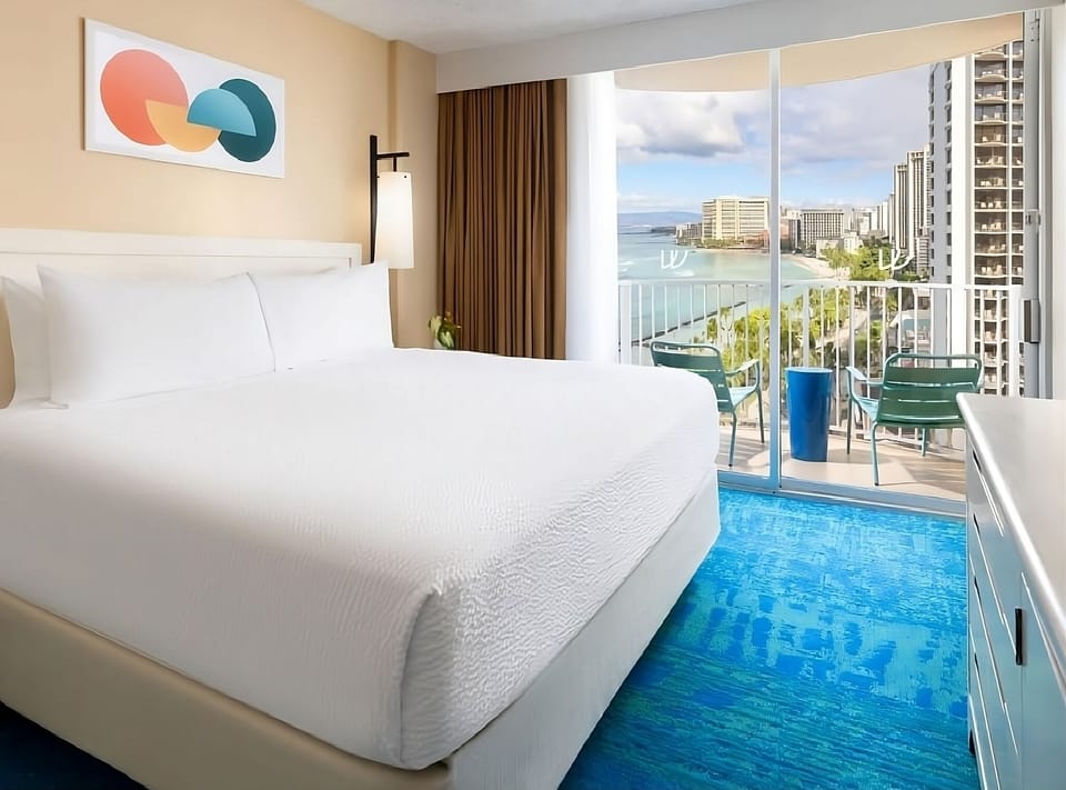 Wake to sweeping ocean views from your bed and balcony.