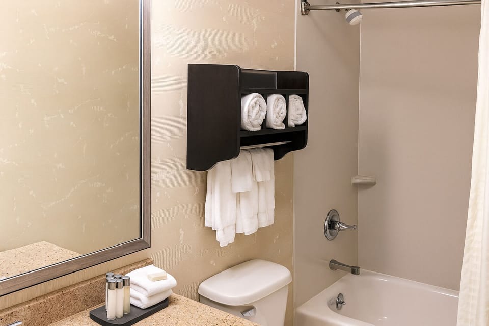 Start your day with plush towels and a tidy bath setup.